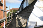 Stripping the Roof Tiles below dormers Stripping the Roof Tiles below dormers